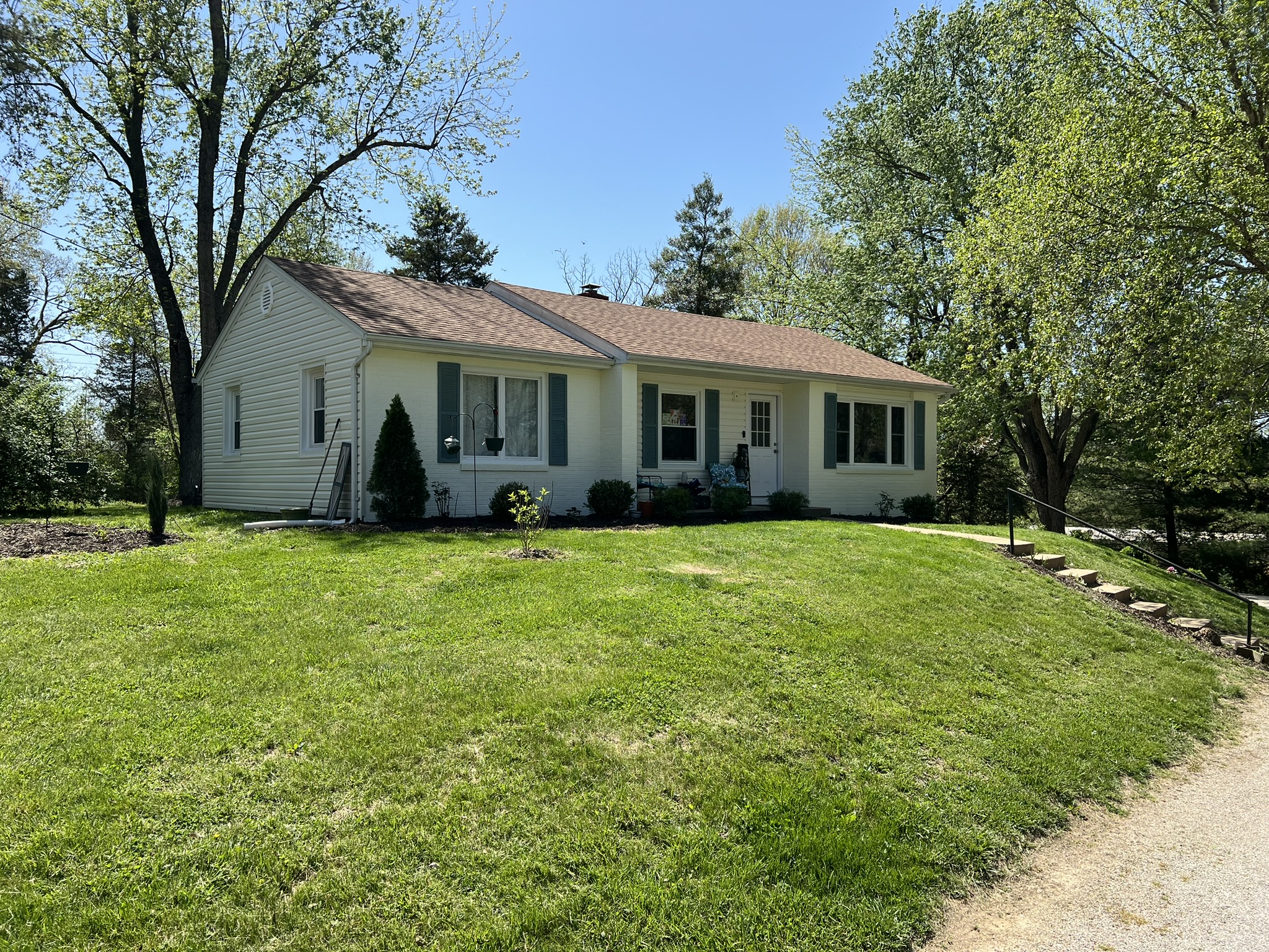 This home after repainting by Kevin and contracted siding installation