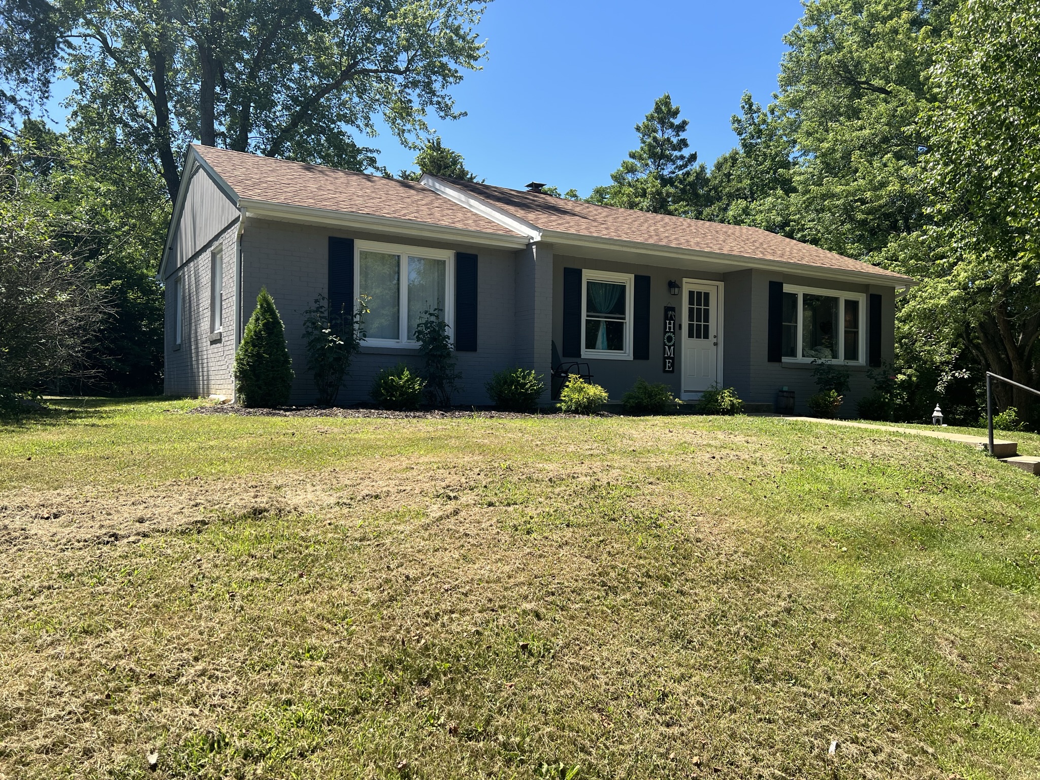 This home before repainting and contracted siding installation